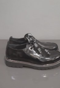 Tucino czarne buty kokardka